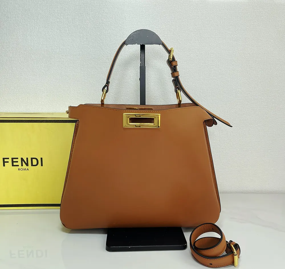 Side profile showing strap and leather texture on Fendi Women Peekaboo Soft Medium Bag