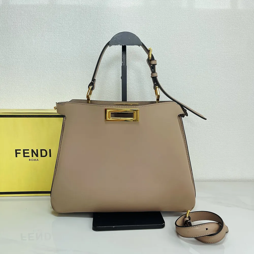 Side angle showing silhouette of Fendi Women Peekaboo Soft Medium Dove Gray Leather Bag