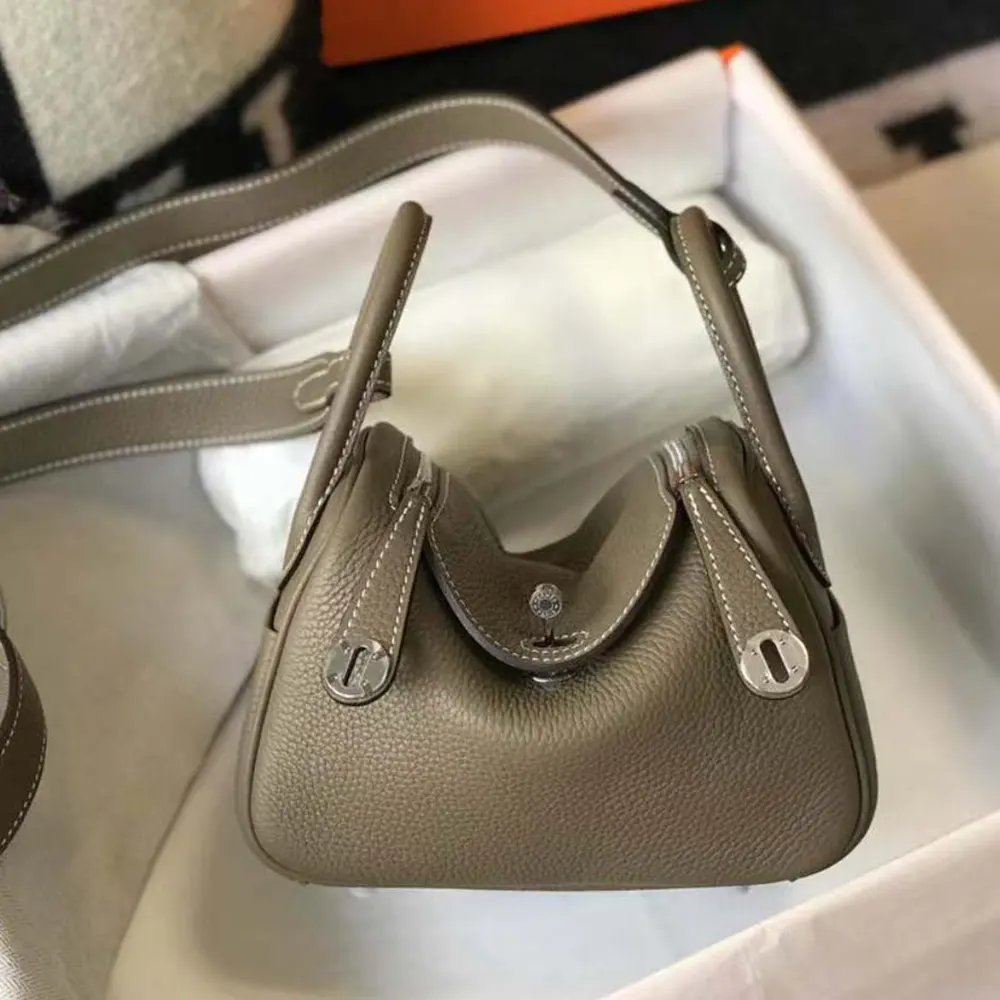 Close-up of silver hardware on Hermes Women Lindy Mini 19 bag