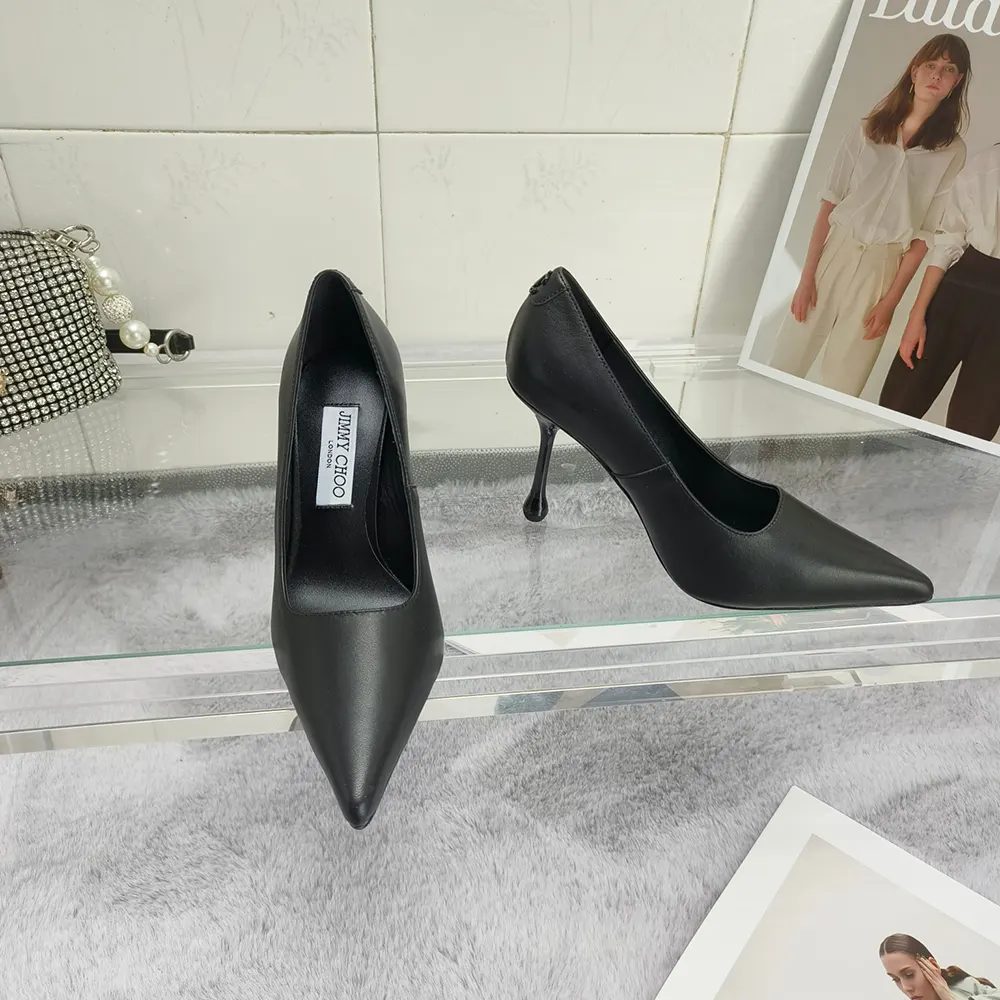 Close-up detail of Jimmy Choo embossed logo on Ixia 80 pumps