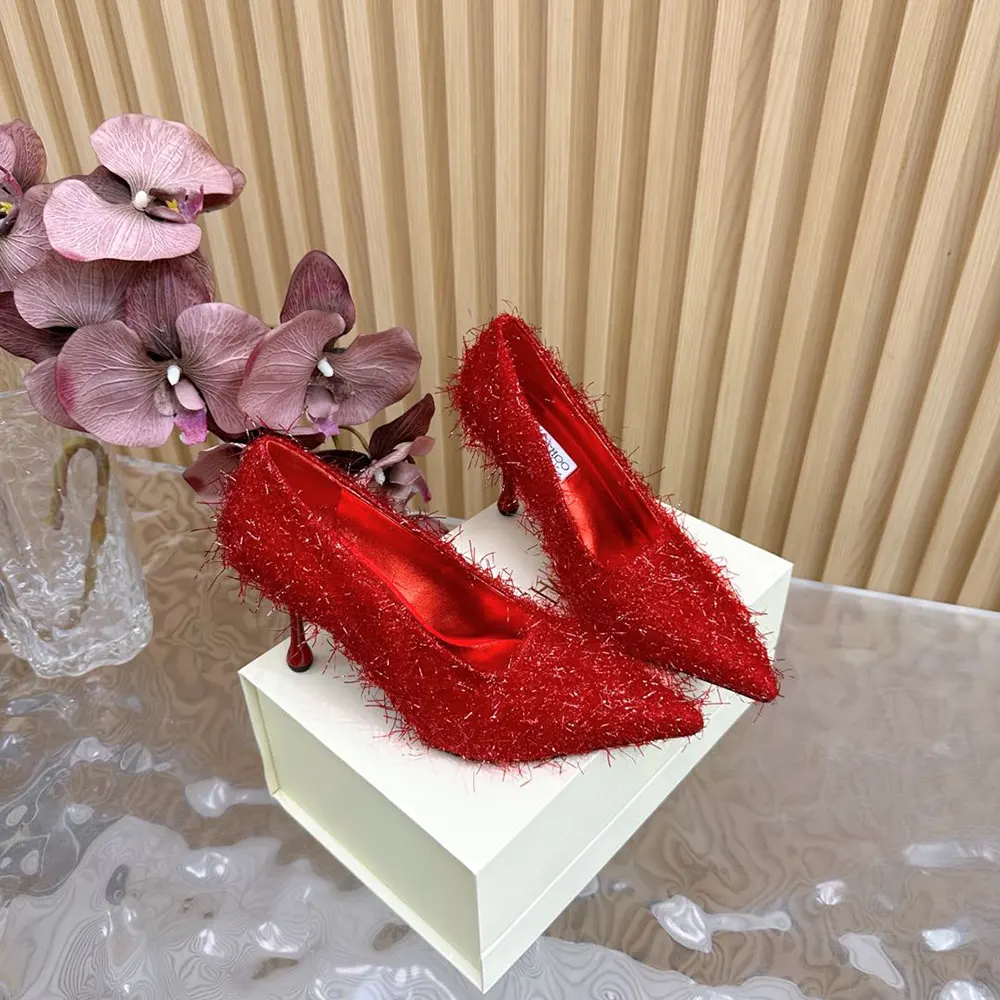 Side profile showcasing stiletto heel of Jimmy Choo Women Ixia 95 Ruby Red Pumps