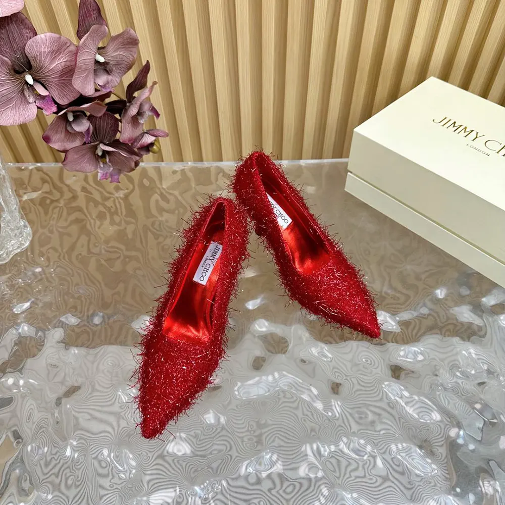Close-up on shimmering tinsel fabric of Jimmy Choo Ixia 95 pumps