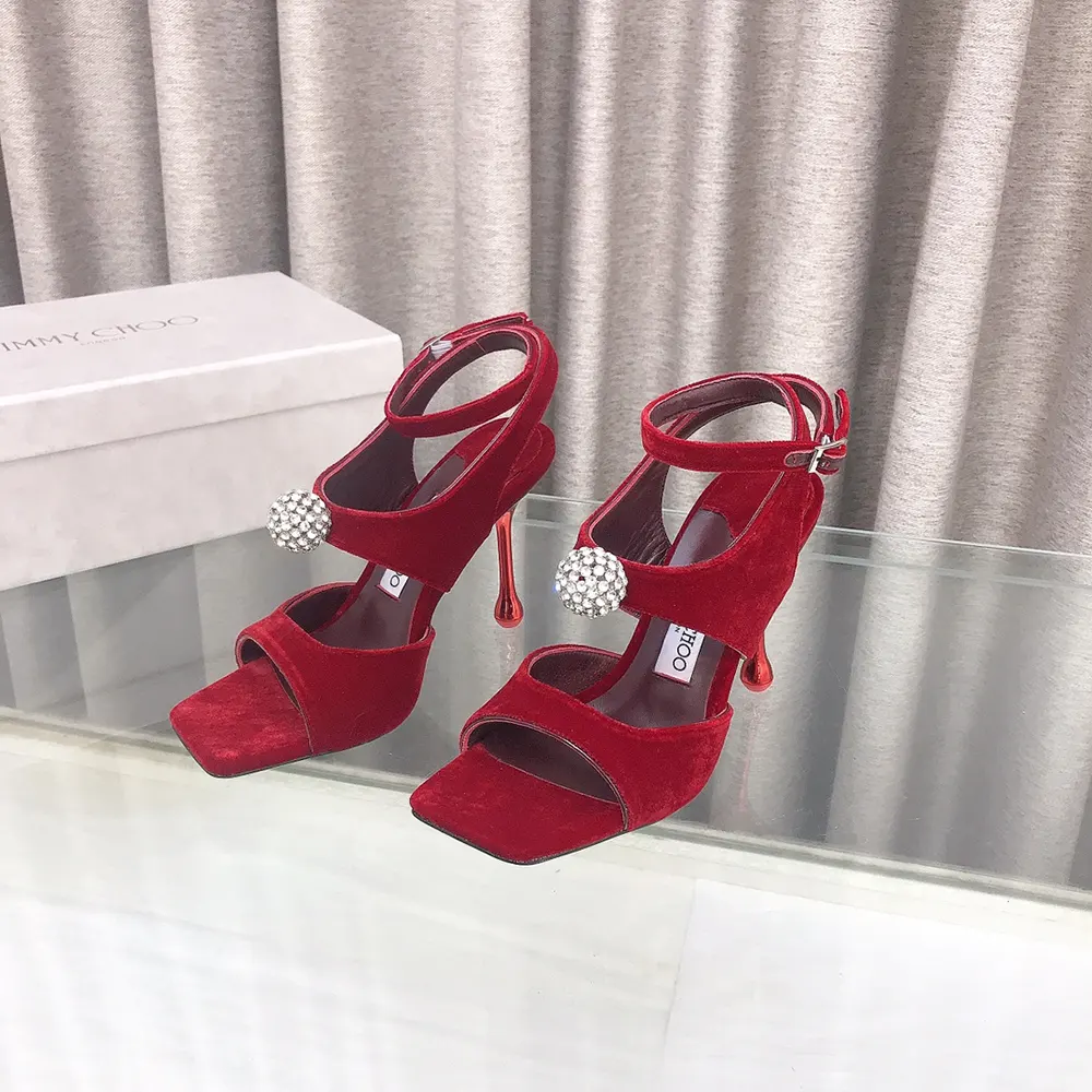 Rear angle showing adjustable buckle on Jimmy Choo Women Orb 95 sandals
