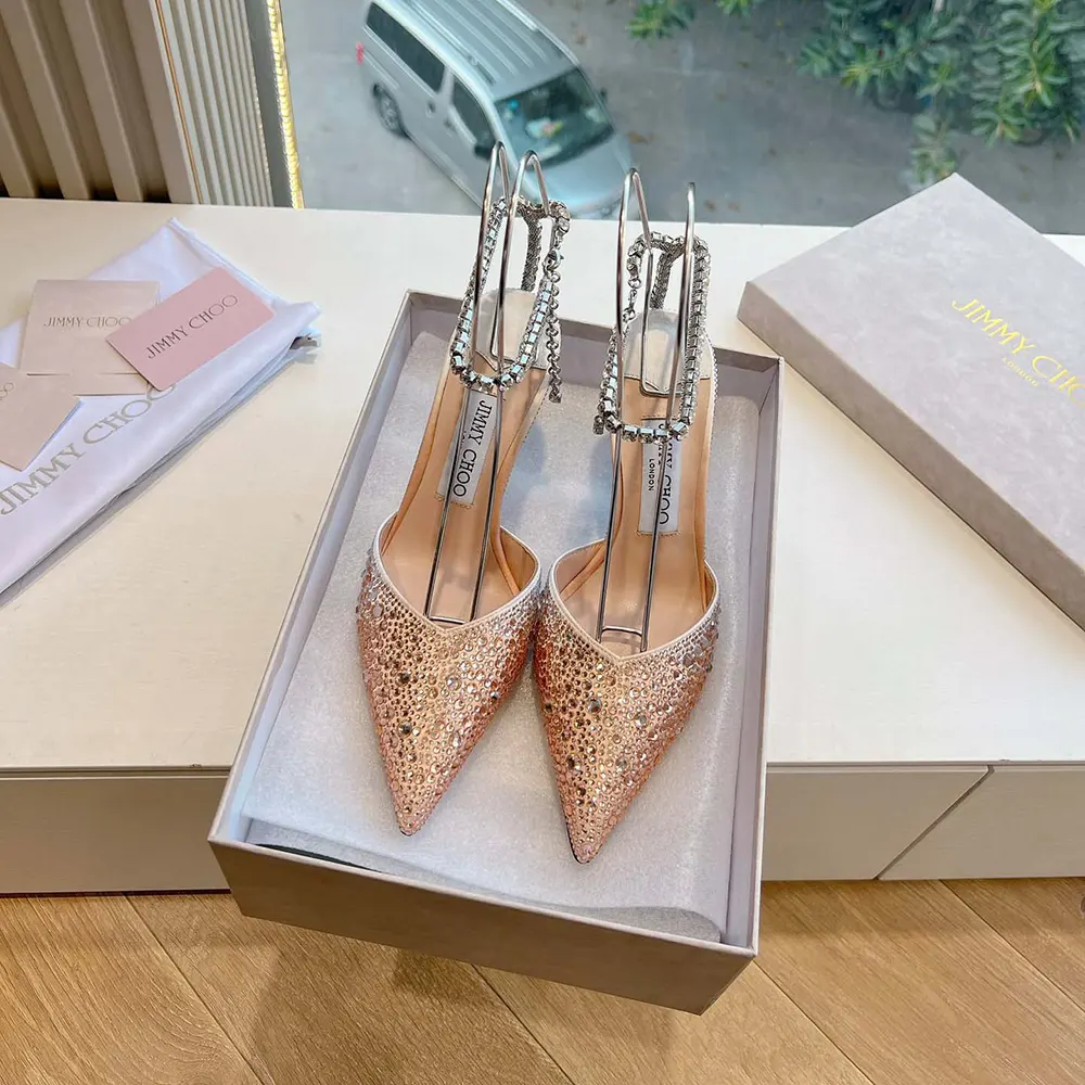 Close-up on crystal embellishments of Jimmy Choo Women Saeda 100 pumps
