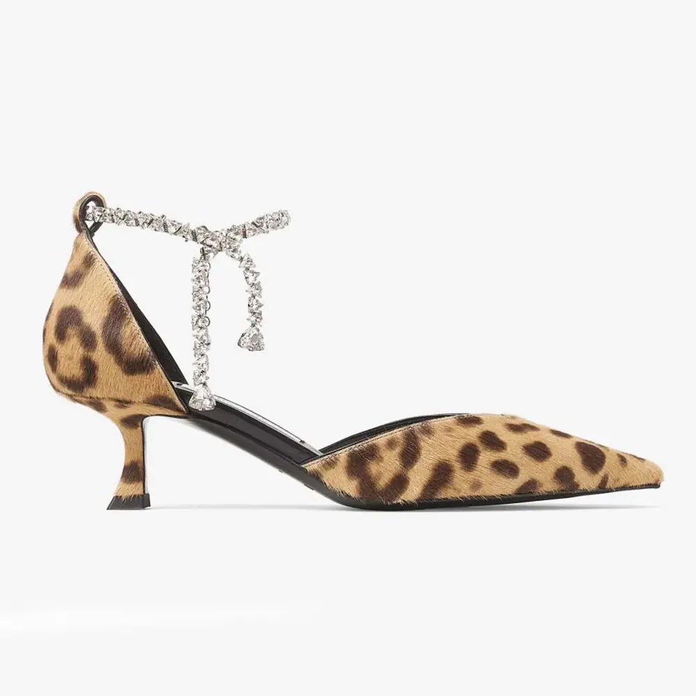 Side view of Jimmy Choo Women Stevie 50 Natural Leopard Print Pony Pumps