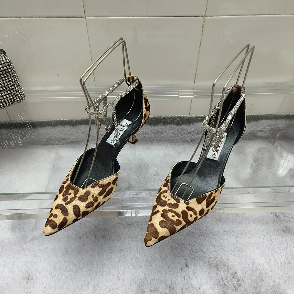 Front angle showing sleek silhouette of Jimmy Choo Stevie 50 pumps