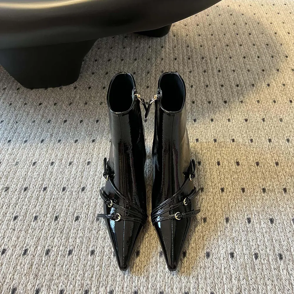 Close-up of zip closure and signature hardware on Miu Miu Women Naplak Booties-Black