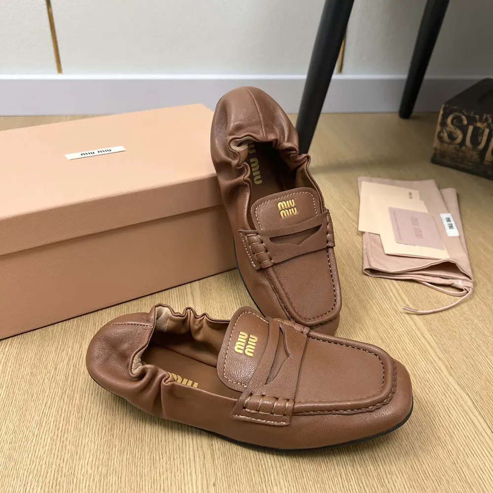 Top down look at slip-on design of Miu Miu Women Nappa Leather Loafers