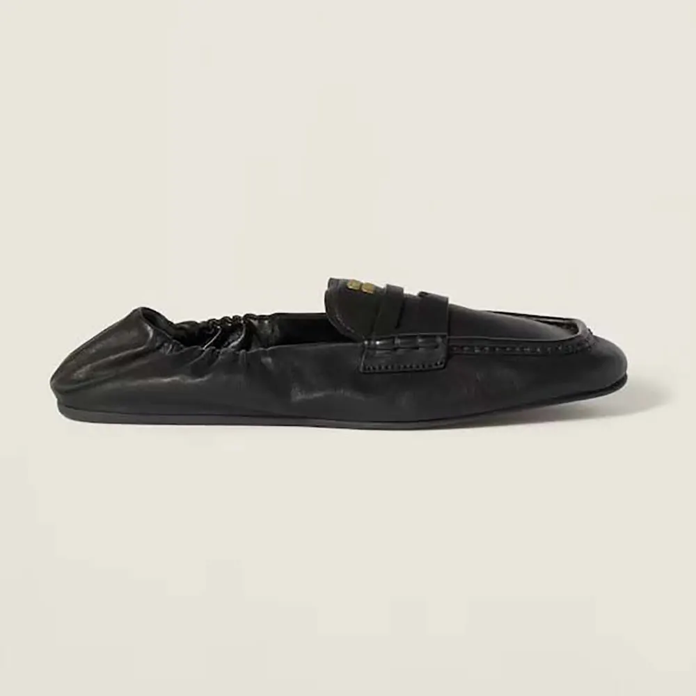 Side profile of Miu Miu Women Nappa leather loafers-Black showing silhouette