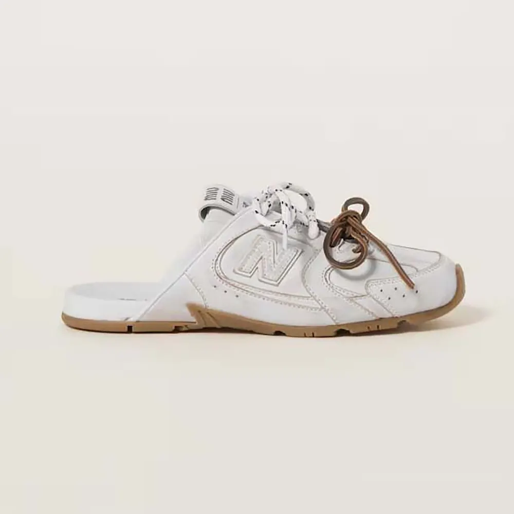 Side profile of Miu Miu Women New Balance X Miu Miu 530 SL Deco Calf Leather Mules-White