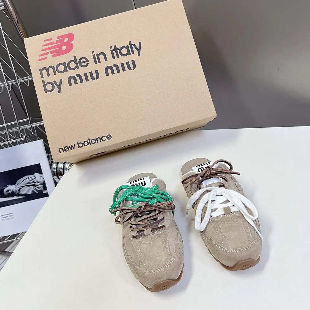 Angled top view showing the chunky mule silhouette of Miu Miu Women New Balance mules