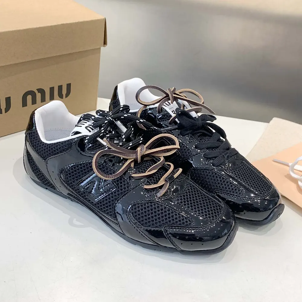 Top-down detail showing logo and silhouette of Miu Miu Women New Balance X Miu Miu 530 SL Sneakers