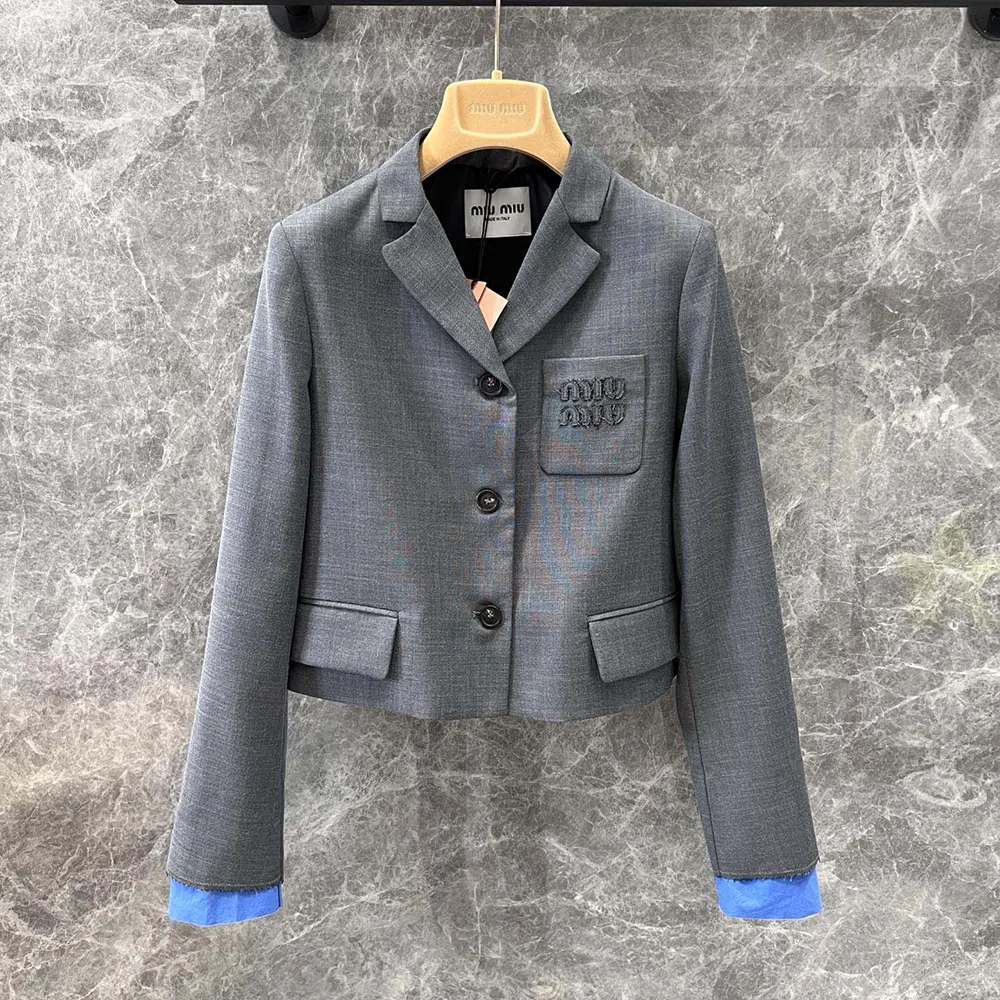 Side profile showing tailored cropped fit of Miu Miu Women Gabardine Jacket