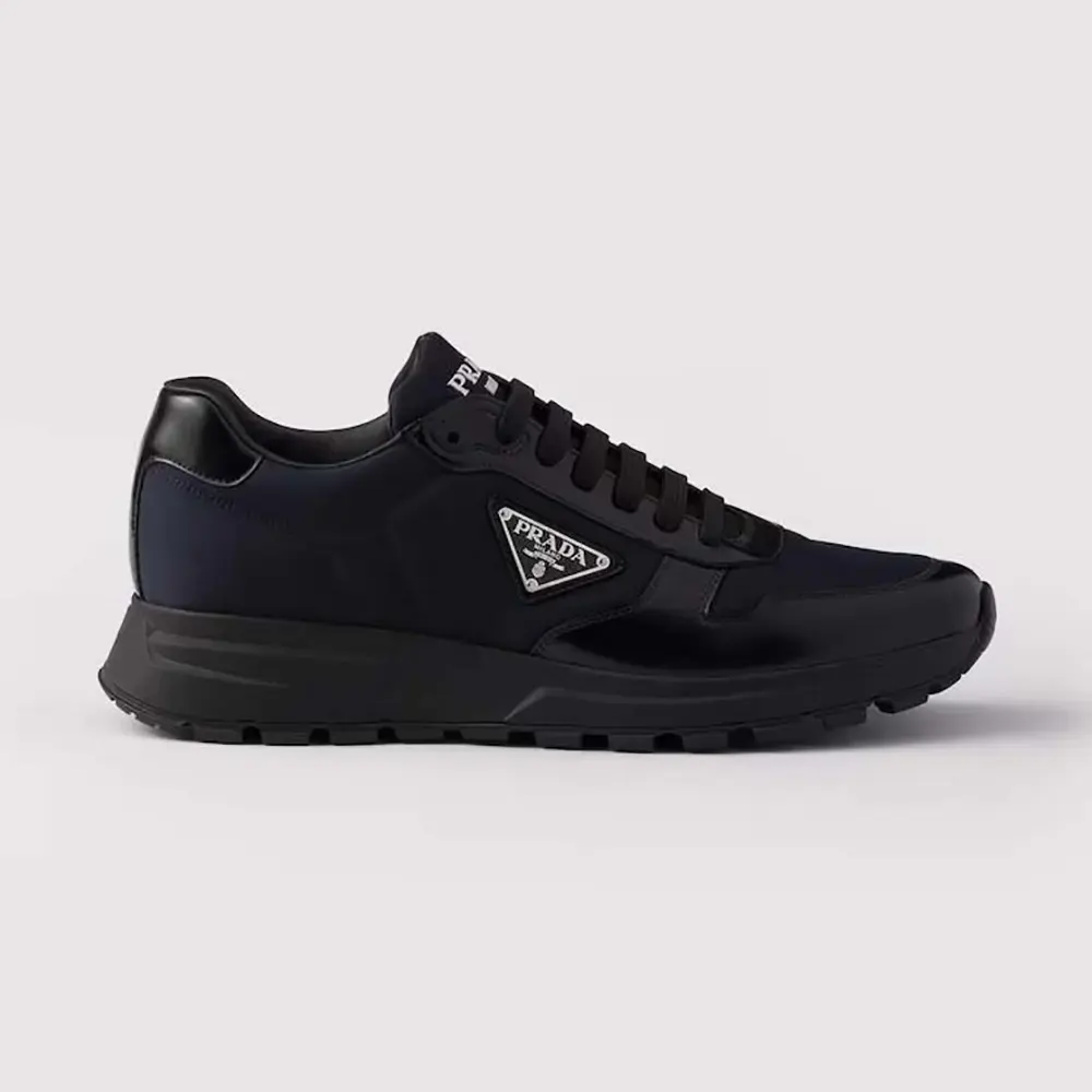 Side profile of Prada Unisex Prax 01 Re-Nylon and Brushed Leather Sneakers