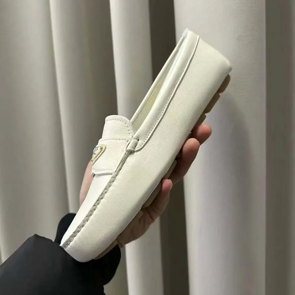 Top view showing slip-on design of Prada Women Leather Driving Shoes-White