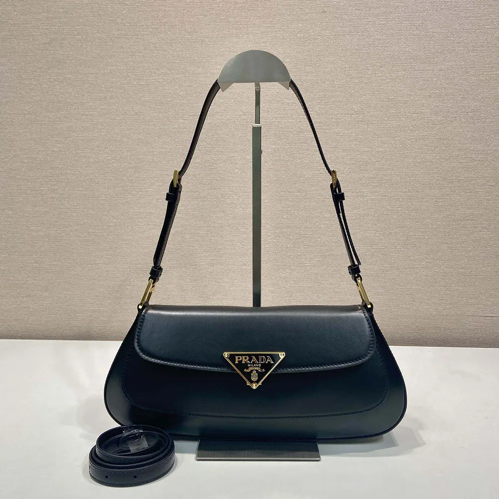 Close-up of silver-tone hardware on Prada Women Leather Shoulder Bag-Black