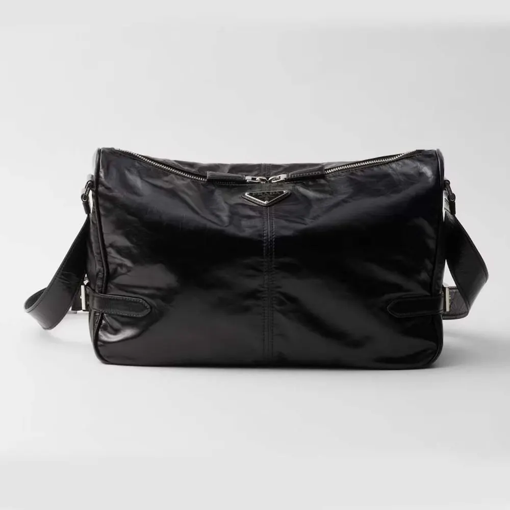 Front angle of Prada Women Leather Shoulder Bag-Black showing gold hardware