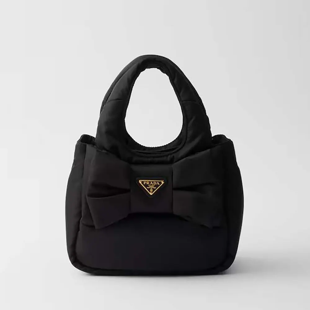 Front view of Prada Women Padded Re-Nylon Mini-bag with Bow in black
