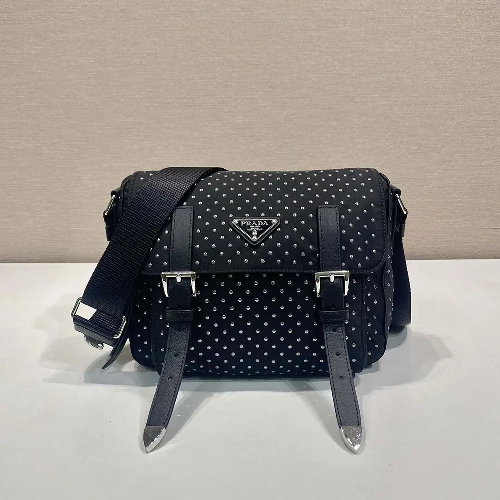 Close-up on silver-tone studs of Prada Women Re-Nylon Shoulder Bag
