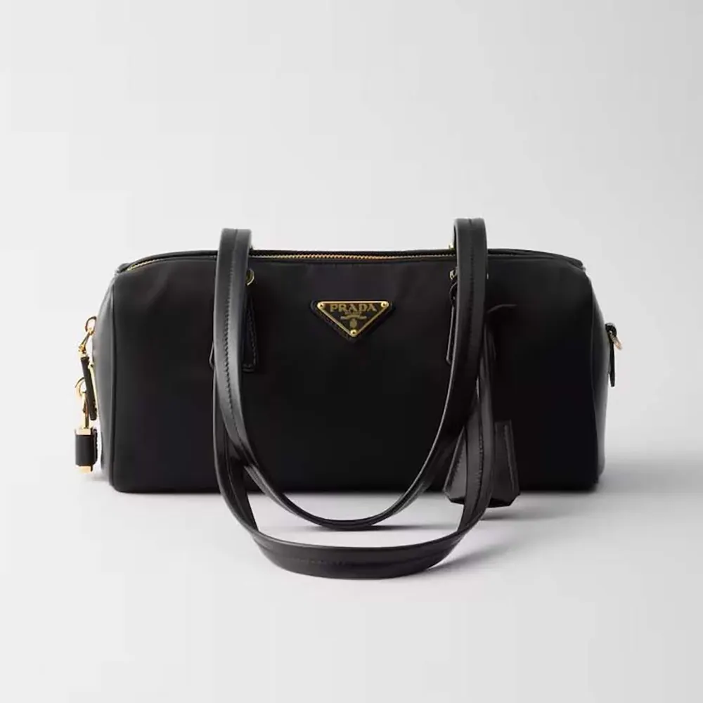 Front angle of Prada Women Re-Nylon and Leather Medium Top-handle Bag with Padlock-Black