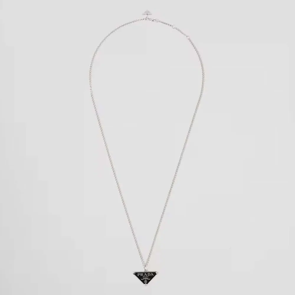 Close-up of Prada Women Symbole Necklace black resin and logo detail