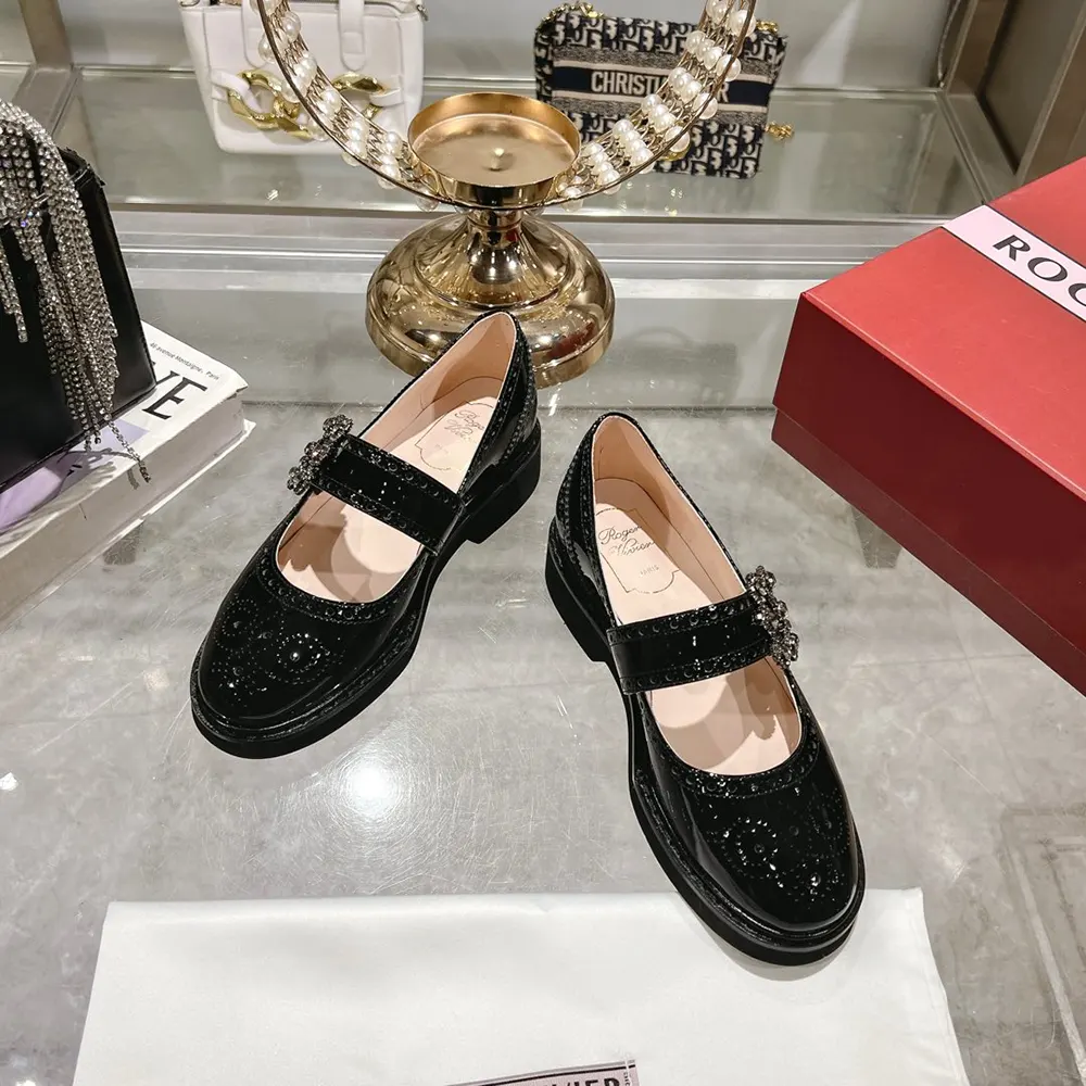 Top angle showing adjustable buckle and leather texture on Roger Vivier Women Viv’ Rangers Mary Janes