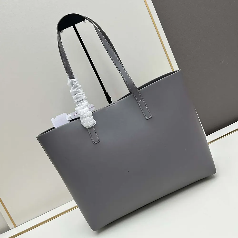 Side angle showing leather texture and zip closure detail