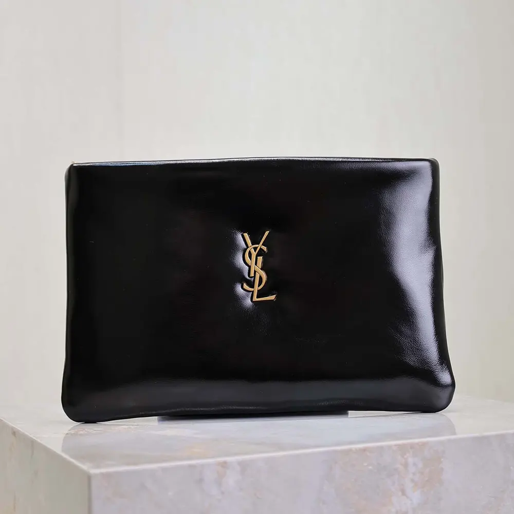 Close-up of gold YSL logo hardware on Saint Laurent YSL Women Calypso Small Pouch