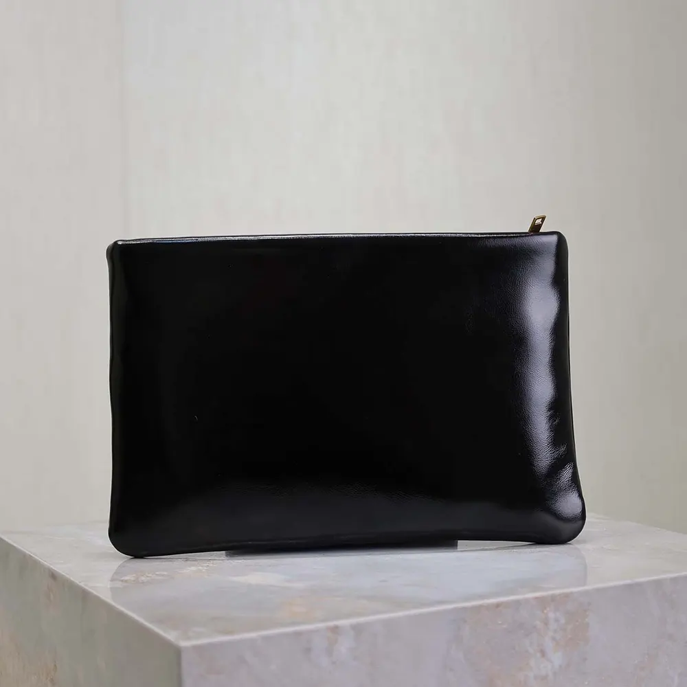 Side angle showing compact silhouette of Saint Laurent YSL Women Calypso Small Pouch