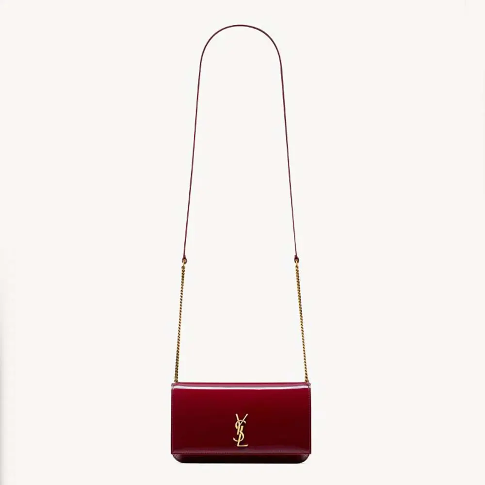 Front view of Saint Laurent YSL Women Cassandre Phone Holder in burgundy patent leather