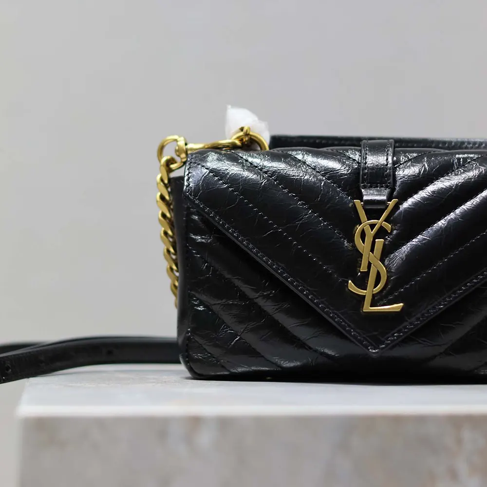 Side profile showing texture and flap closure of Saint Laurent YSL Women College Mini Chain Bag
