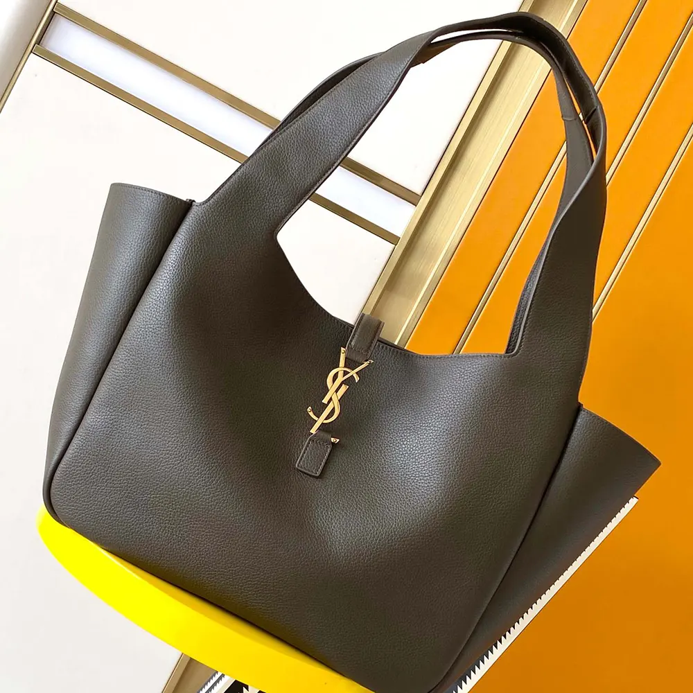 Close-up of gold YSL logo hardware on Le 5 à 7 Bea bag