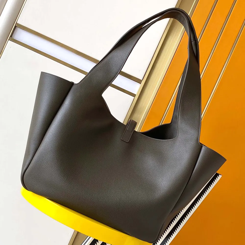 Side angle showing textured grained leather on Saint Laurent Le 5 à 7 Bea