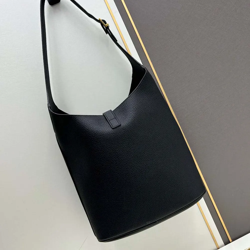 Side profile showing soft silhouette of Saint Laurent YSL Le 5 à 7 Hobo bag