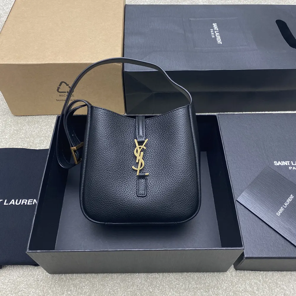 Side angle showing adjustable shoulder strap on Saint Laurent YSL Supple Baby bag