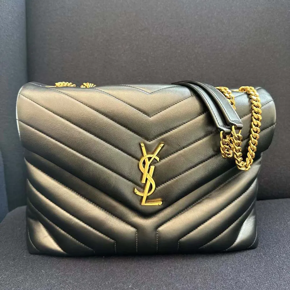 Side profile showing quilted matelassé leather on Saint Laurent YSL Women Loulou Medium Bag