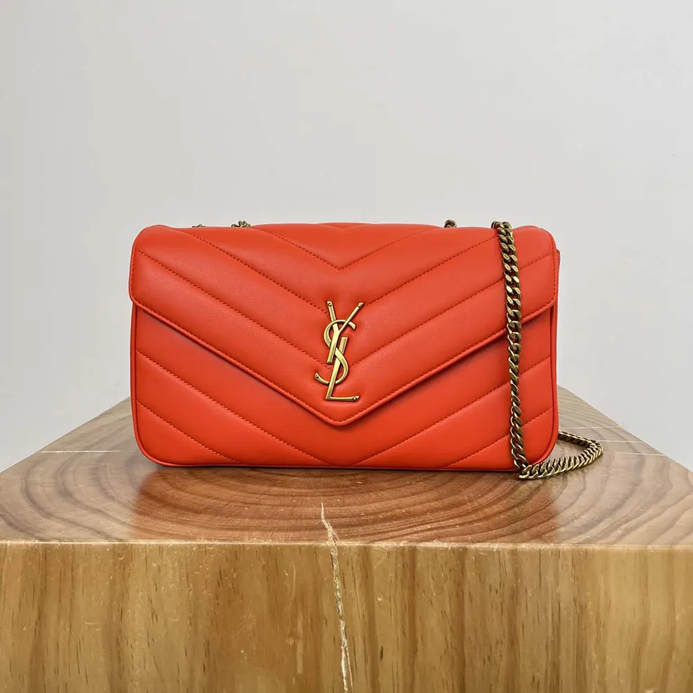 Side angle showing matelasse quilting on Saint Laurent YSL Loulou Medium