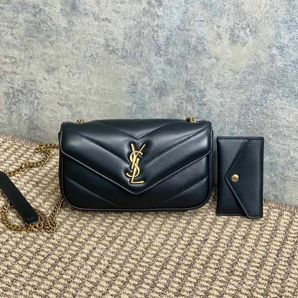 Close-up of gold YSL logo hardware on Loulou Mini bag