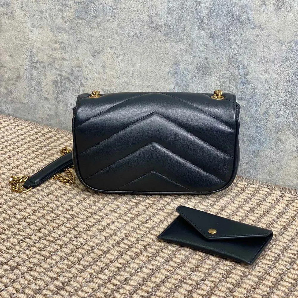 Side angle showing lambskin texture on Saint Laurent Loulou Mini