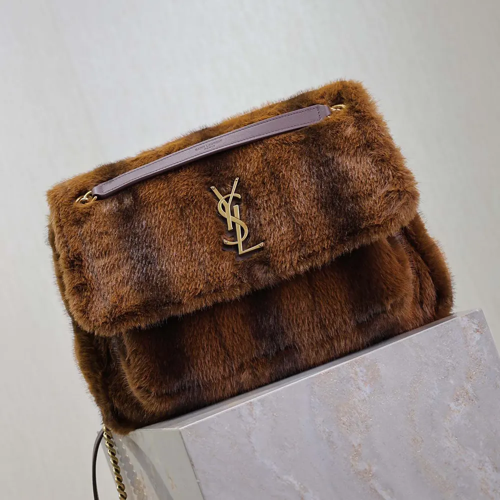Side angle showing shearling texture and magnetic closure on Saint Laurent YSL Women Niki Large