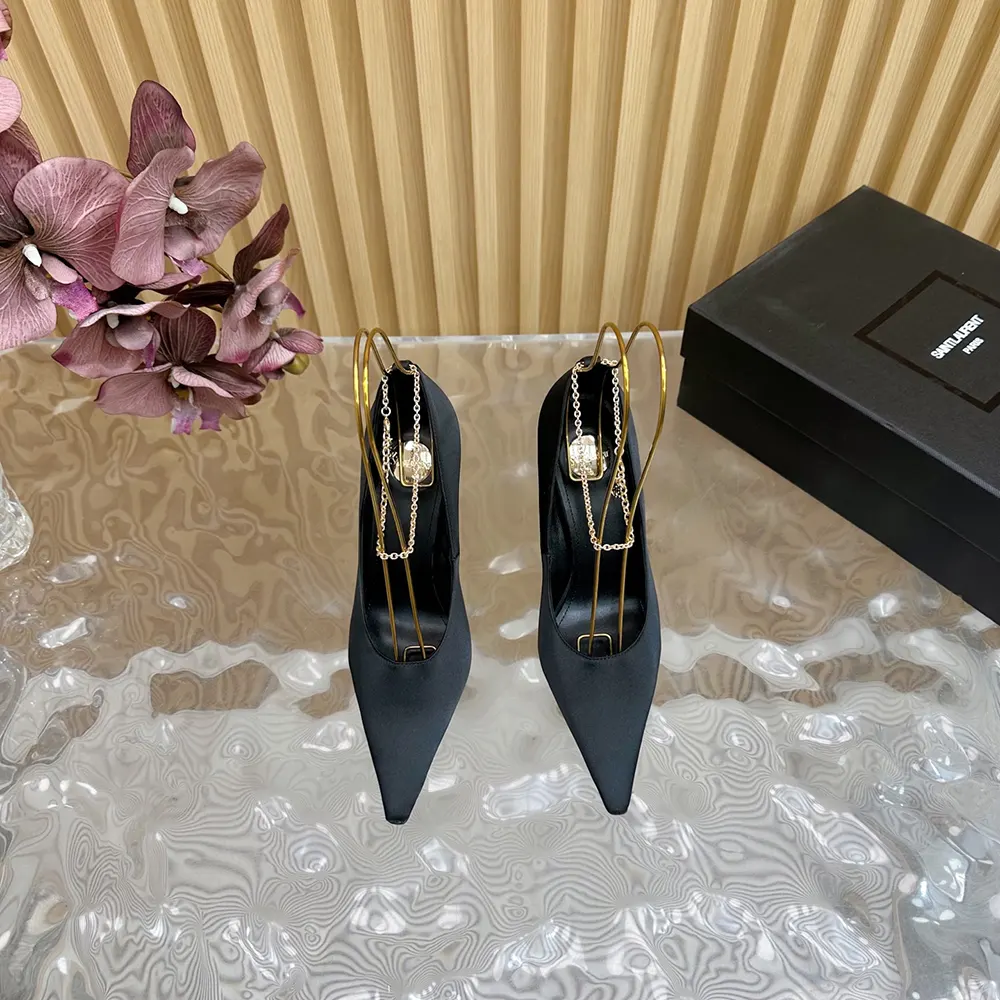 Top angle showing sleek silhouette of Saint Laurent YSL Regine Pumps