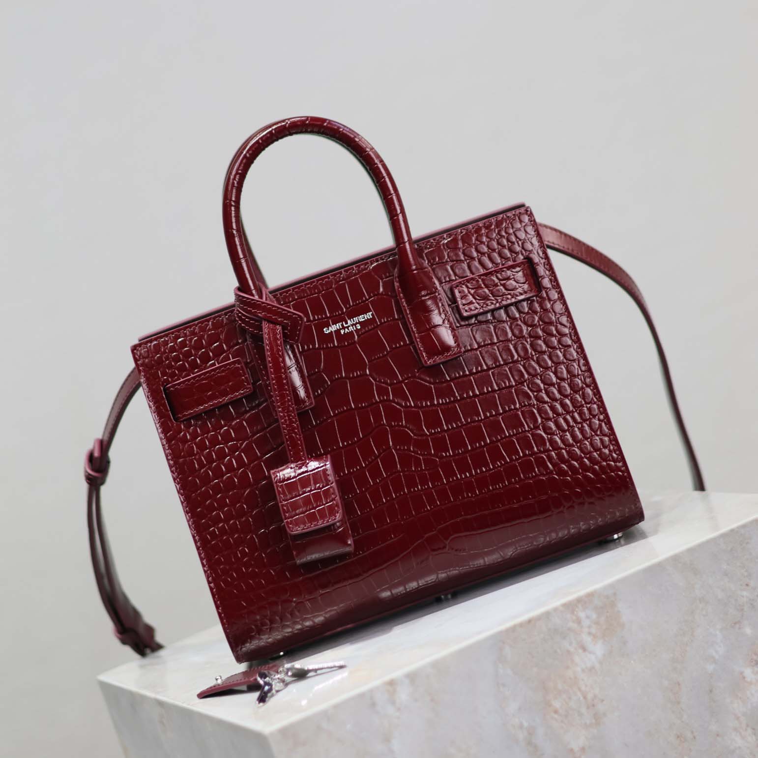 Side angle showing structured silhouette of Saint Laurent YSL Sac De Jour bag