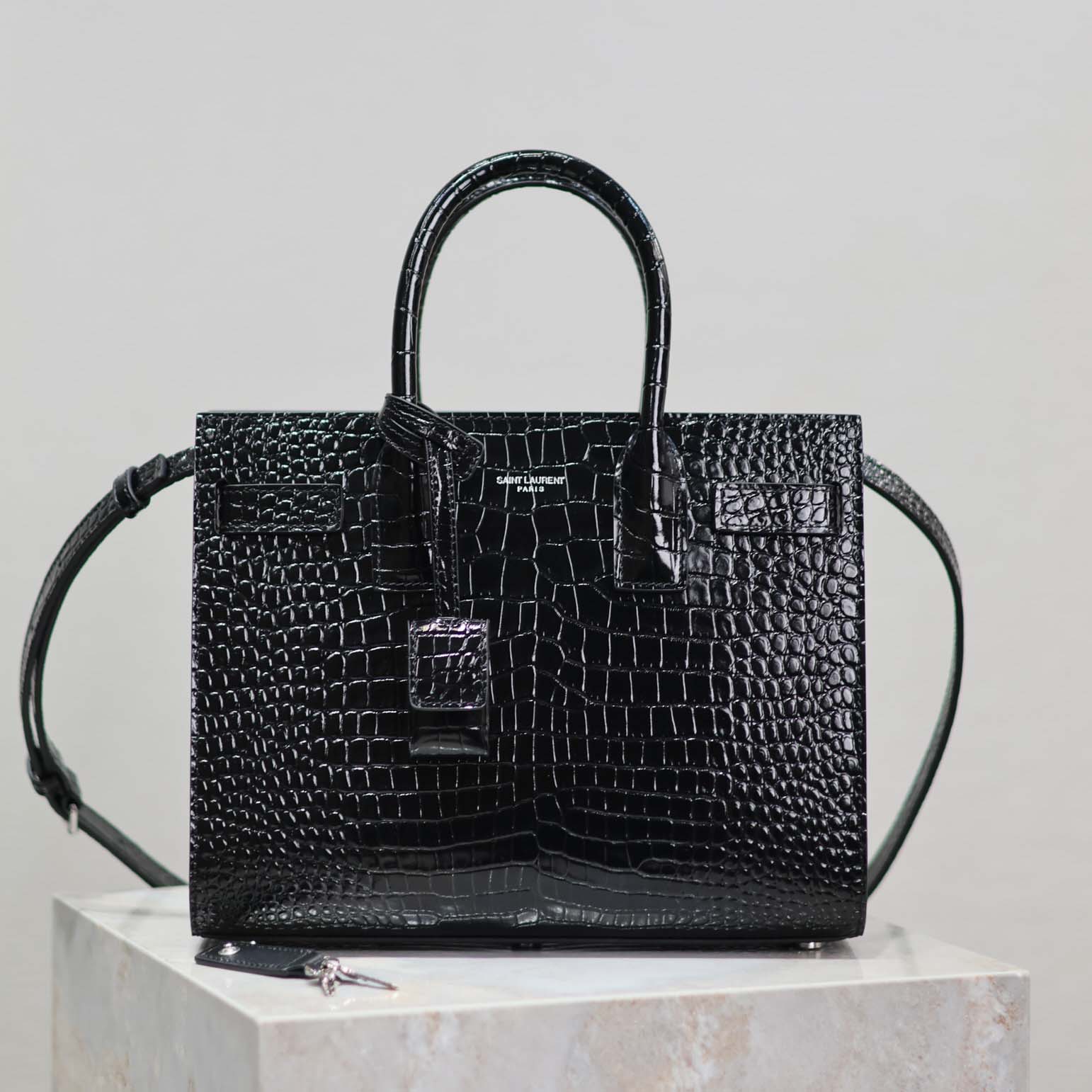 Side profile showing structured silhouette of Saint Laurent YSL Sac De Jour bag