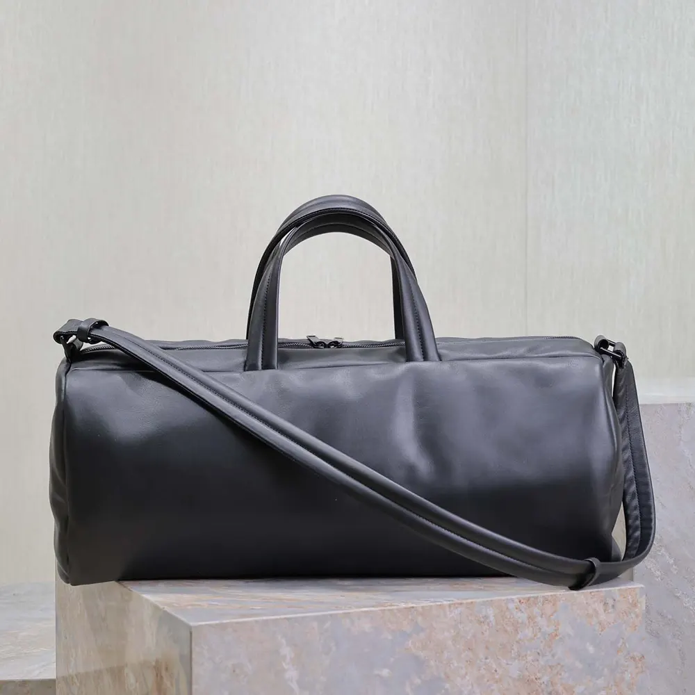 Side angle showing smooth lambskin texture of Saint Laurent YSL Women Saint Laurent Duffle