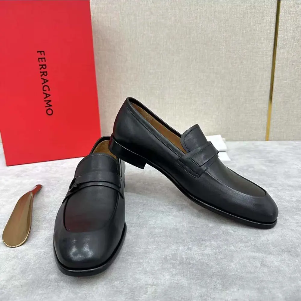 Close-up of Gancini metal ornament on Salvatore Ferragamo Men Moccasin