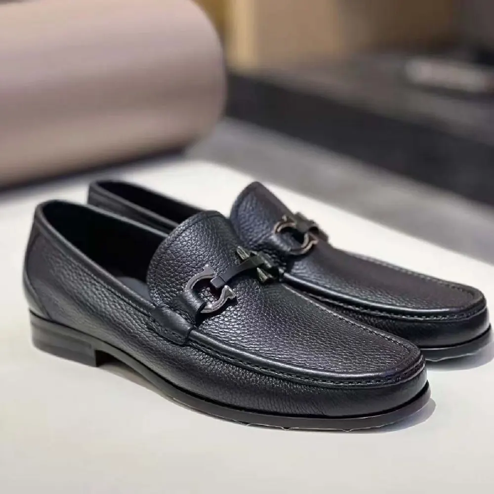 Close-up of Gancini metal ornament on Salvatore Ferragamo Men Moccasin