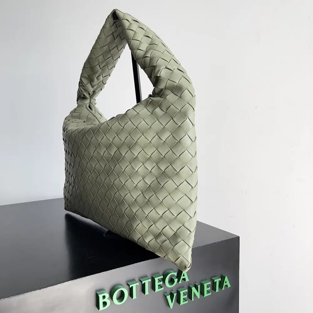 Side angle showing sleek silhouette of Bottega Veneta Women Hop Shoulder Bag