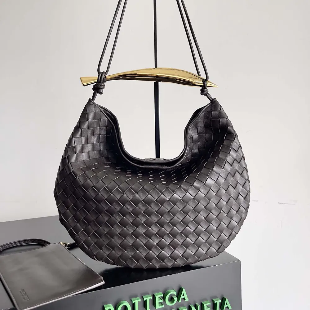 Side angle showing spacious silhouette of Bottega Veneta Women Large Sardine Shoulder Bag