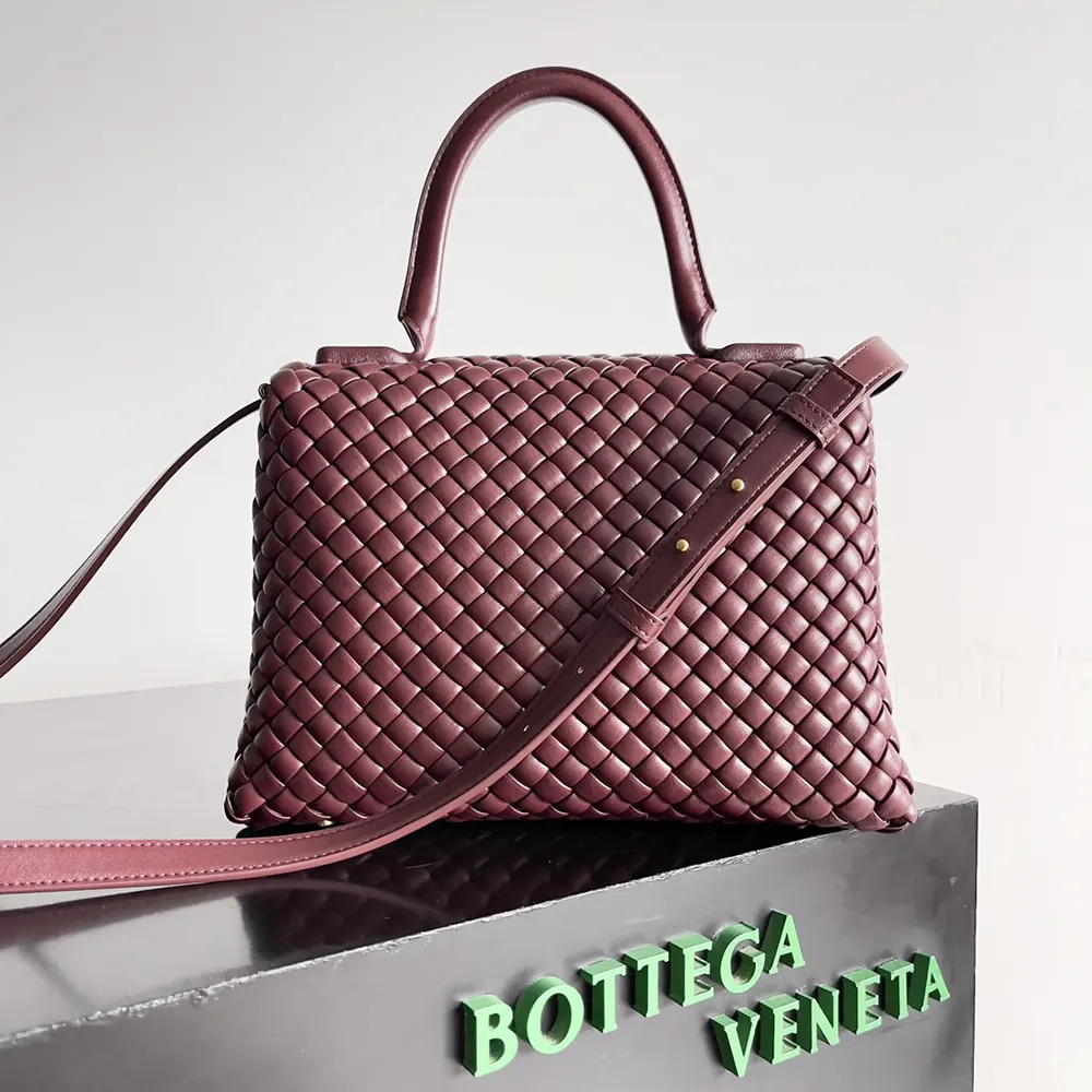 Side angle showing compact silhouette of Bottega Veneta Patti bag