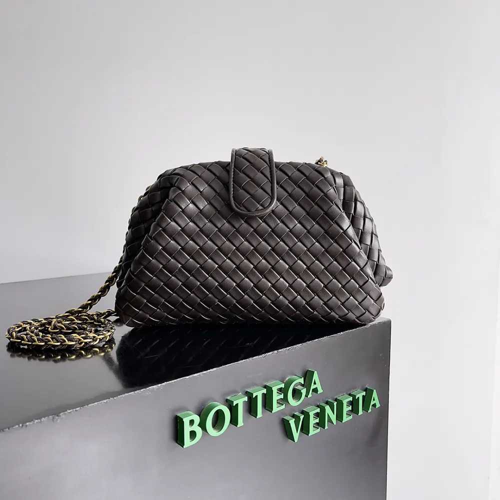 Close-up of intrecciato leather weave and gold hardware on Lauren 1980 bag